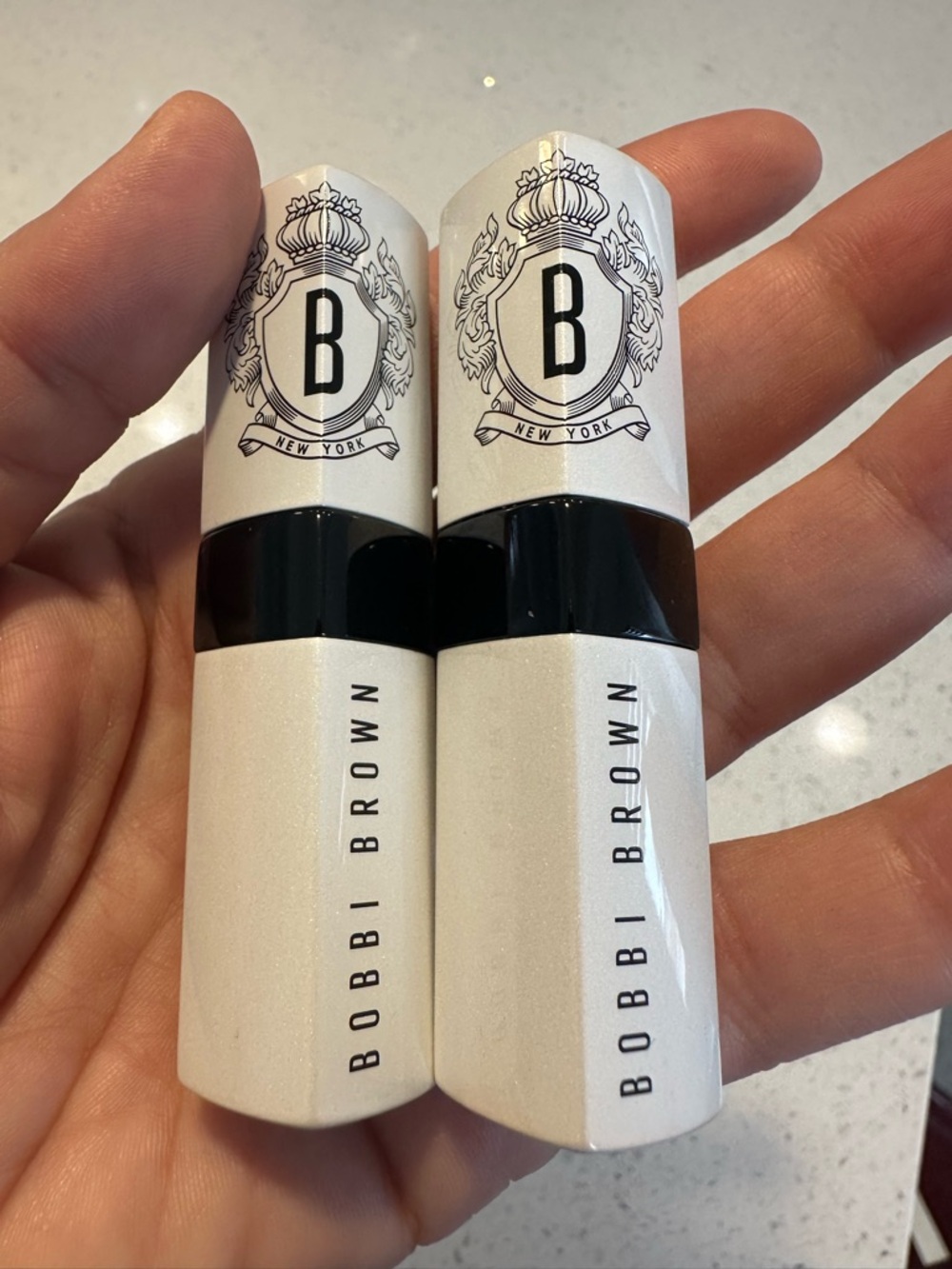 2 Bobbi Brown Lip balms: Bare pink and Bare Raspberry